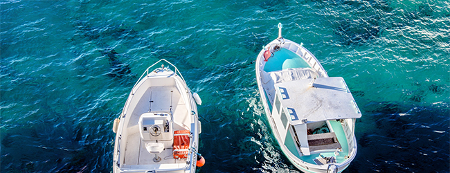 LISA-Sprachreisen-Spanisch-Uruguay-Montevideo-tuerkisblau-Meer-Wellen-Strand-Boote-Fischerboote-Sommer.jpg